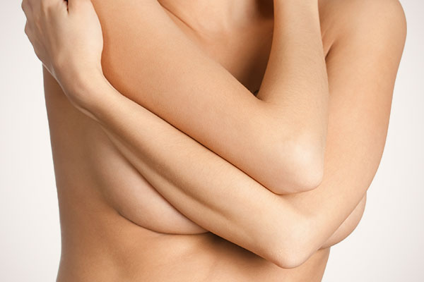 Washington DC DIEP Flap Breast Reconstruction model with arms crossed
